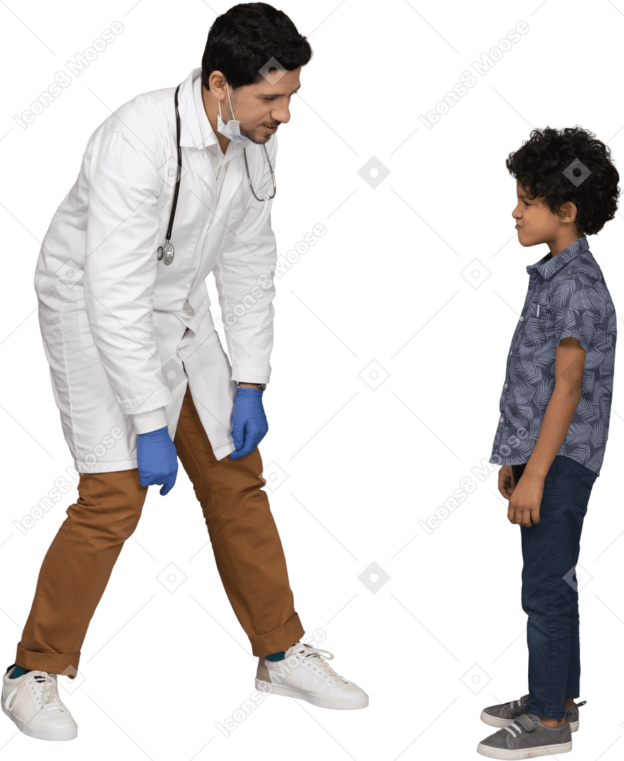 Doctor and boy looking at each other
