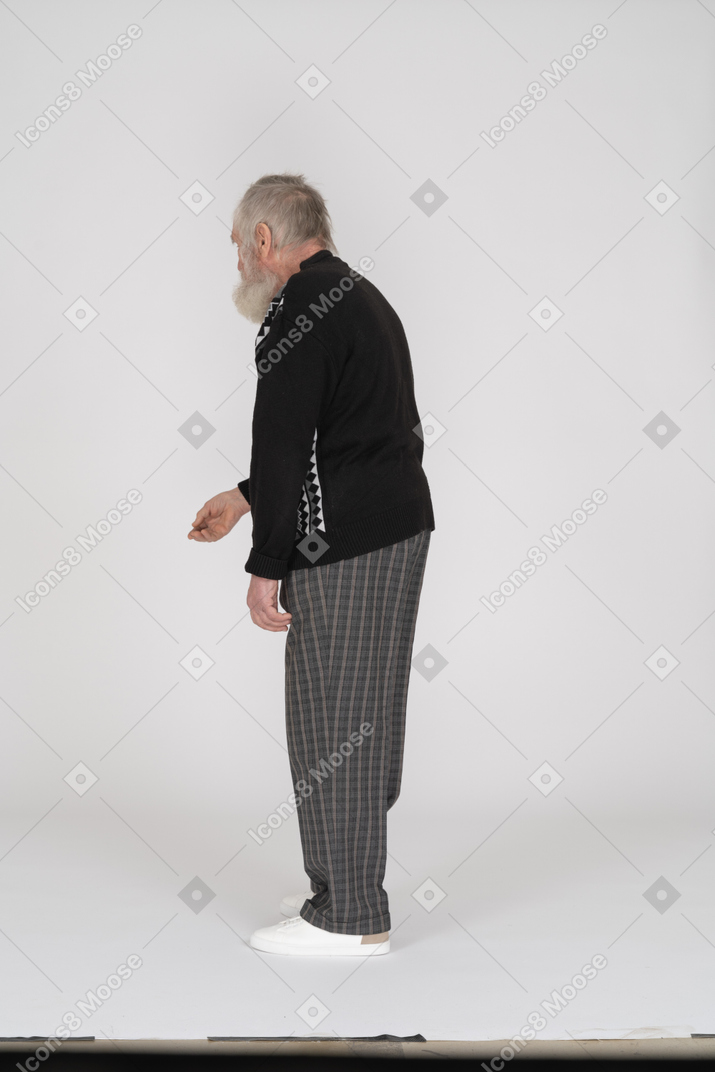 Side view of old man communicating