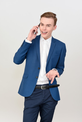 Handsome young man talking on the phone