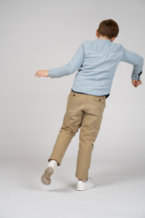 Back view of boy dancing