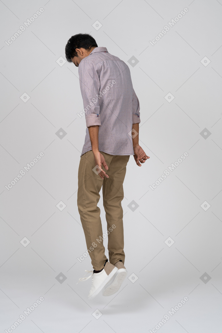 Man in casual clothes jumping