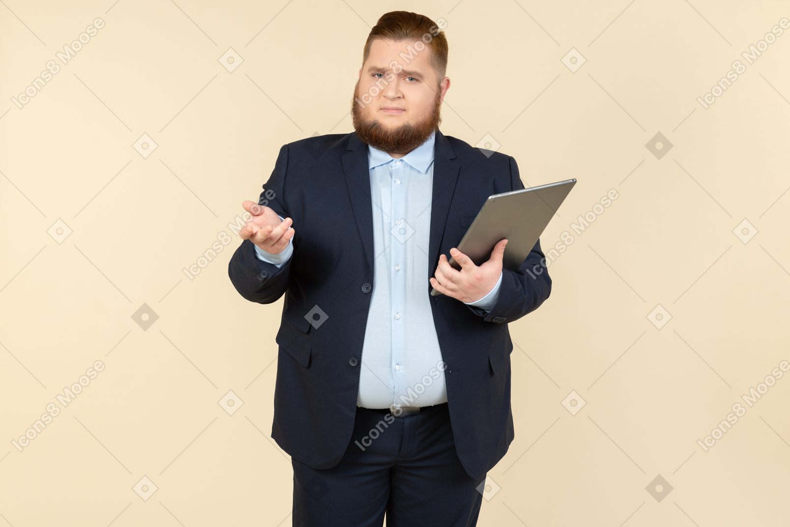 Young overweight office worker seems like not getting something and holding digital tablet
