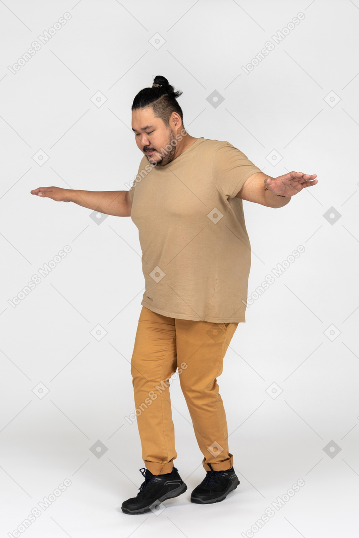 A man standing and balancing