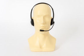 Call-center-headset auf dem mannequinkopf