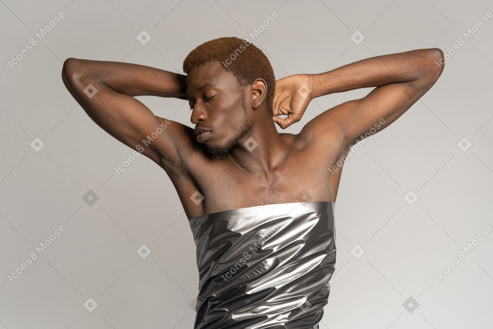 Portrait of man wrapped in silver satin