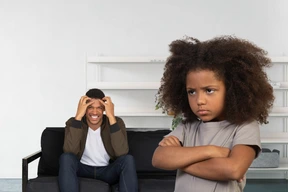 Offended child and angry dad