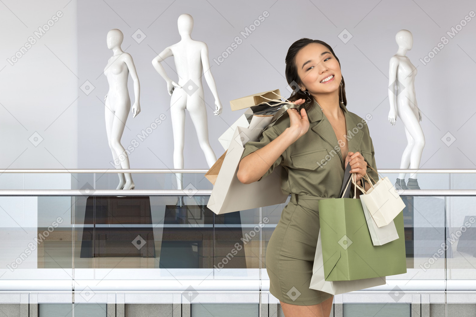 쇼핑몰에서 쇼핑백을 든 젊은 여성