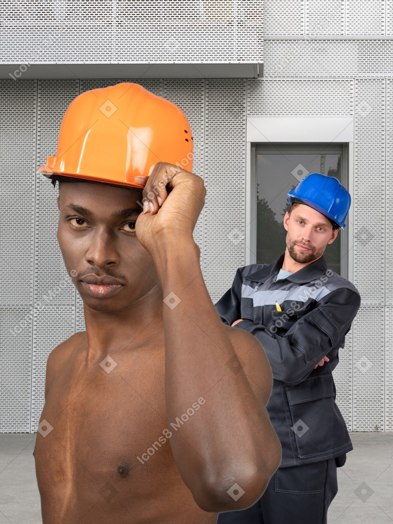Two men in a construction worker uniform