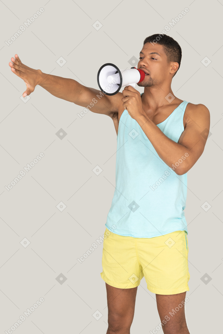 A man with a megaphone in his hand