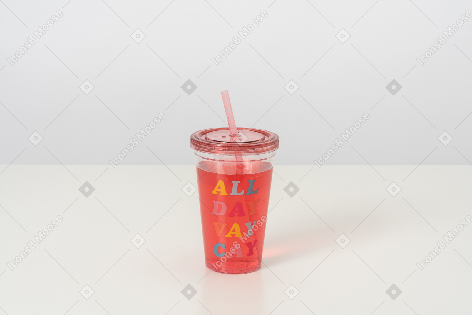 A cute plastic cup with a lid and a straw, full of pink-coloured cocktail, looking cool and aesthetically pleasing
