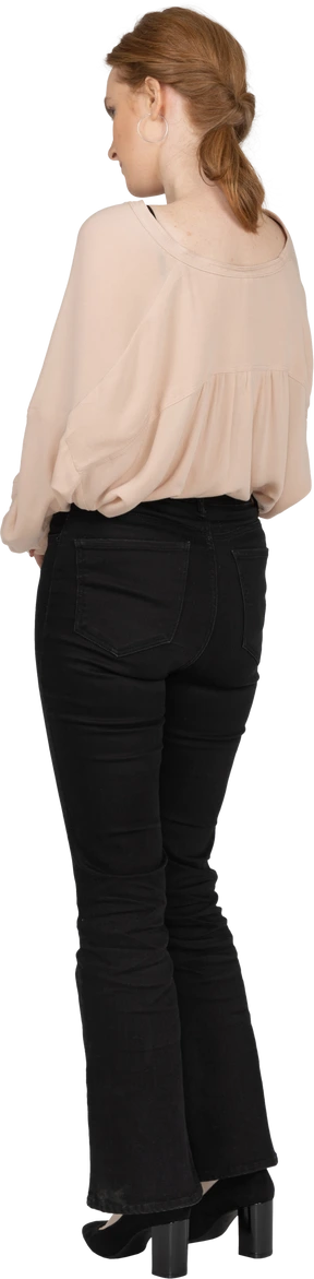 Woman in beautiful blouse standing