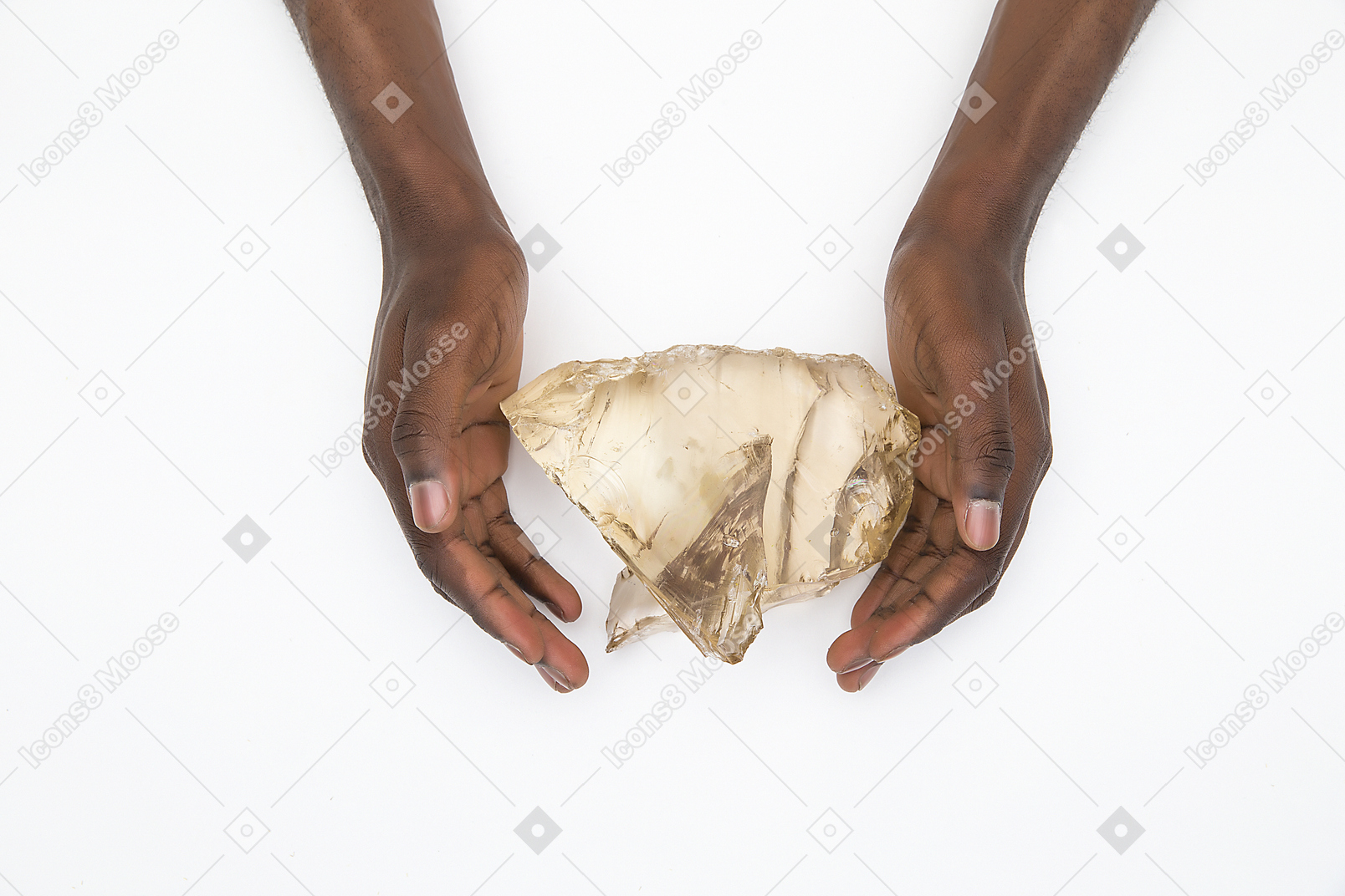 Black male hands holding a seashell
