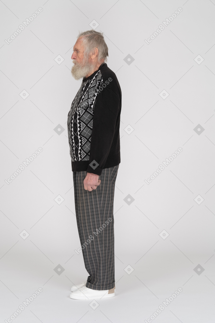 Side view of standing old man
