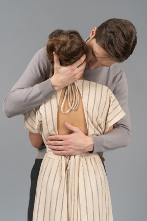 Back view of a couple embracing