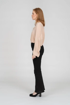 Woman in beautiful blouse standing
