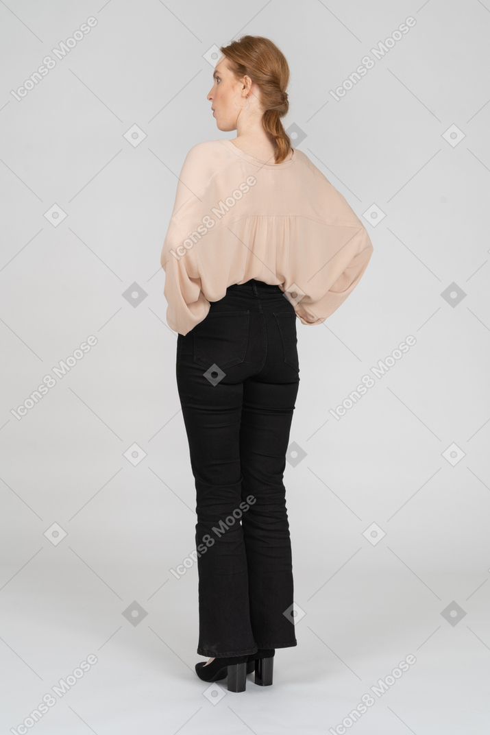 Woman in beautiful blouse standing