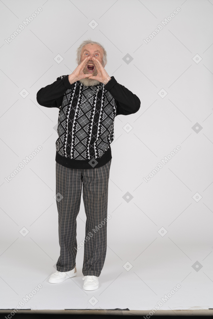 Old man shouting with hands cupped around his mouth