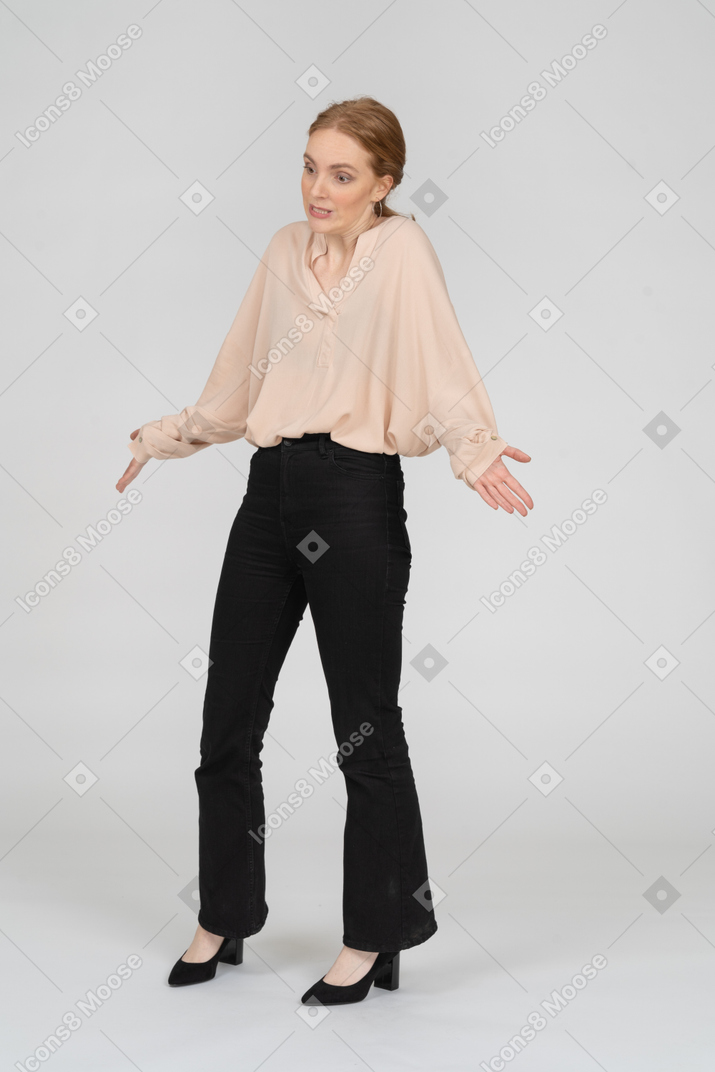 Woman in beautiful blouse standing