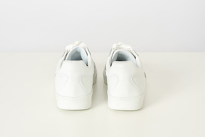 White sneakers on a white background