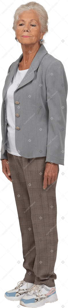 Old lady in suit posing in profile