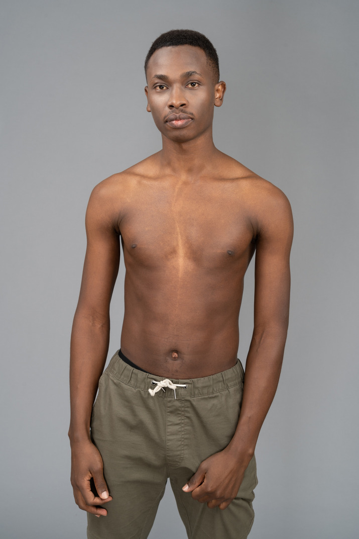 A shirtless young man