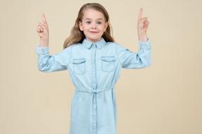 Cute little girl standing and smiling