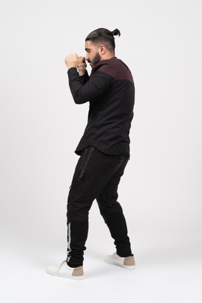 A young man boxing