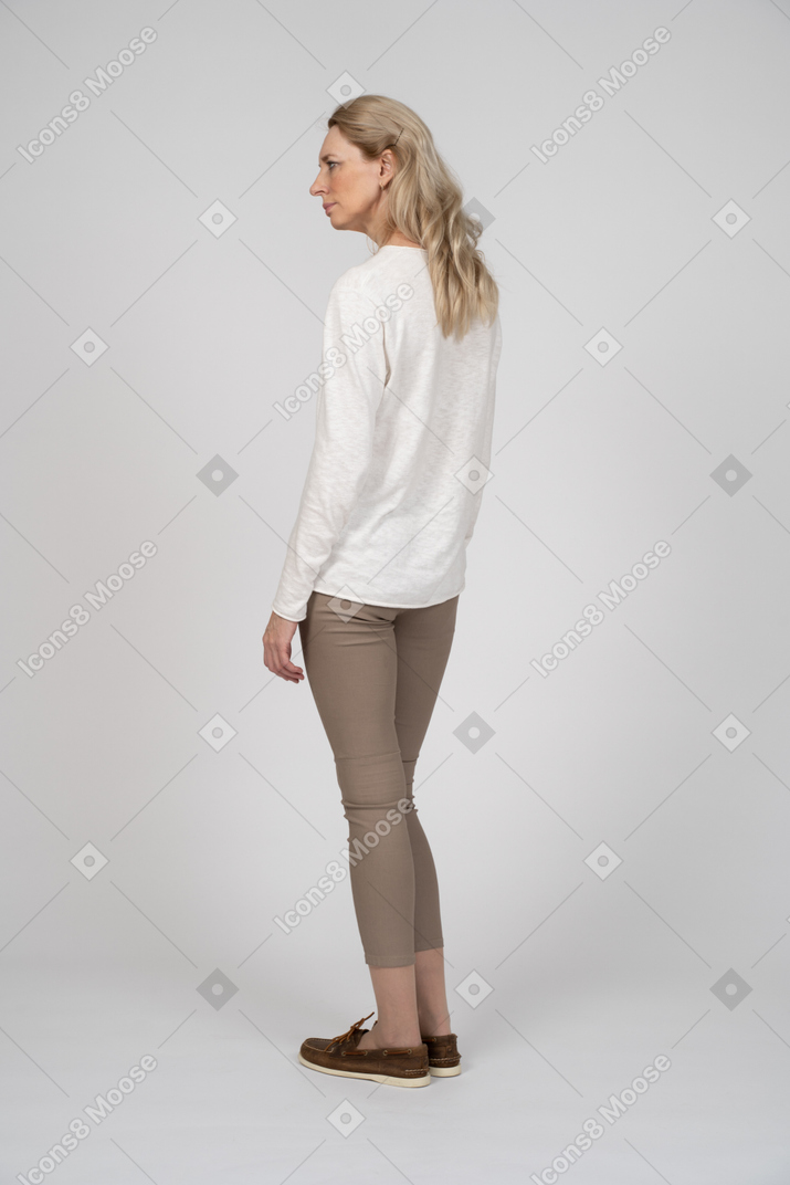 Woman in casual clothes standing