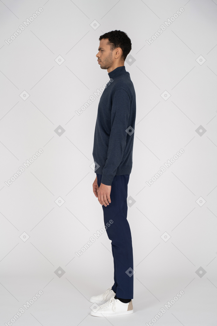 Man in back clothes standing