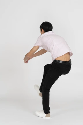Man in casual clothes posing