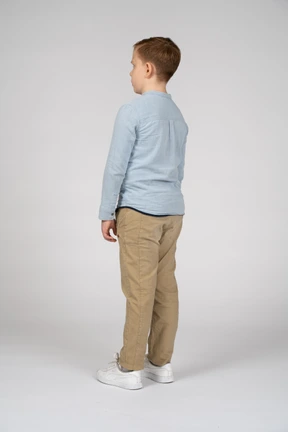 Boy in casual clothes standing still