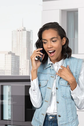 A woman is talking on a cell phone