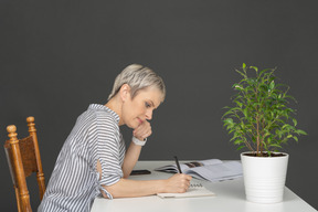 Woman sitting at a table