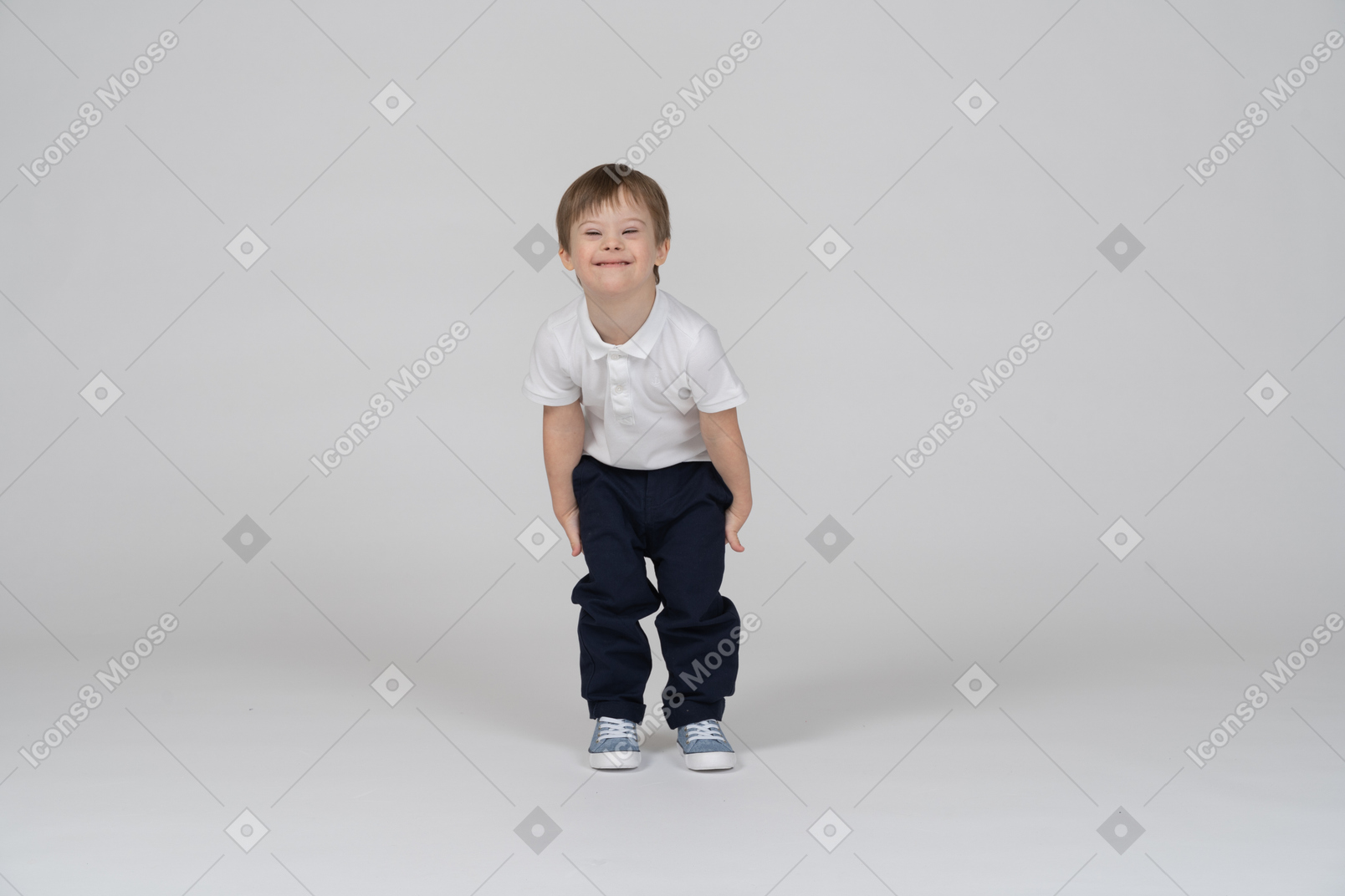 Cheerful child standing with knees slightly bent
