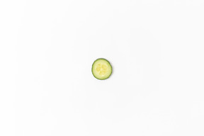 Cucumber slice on white background