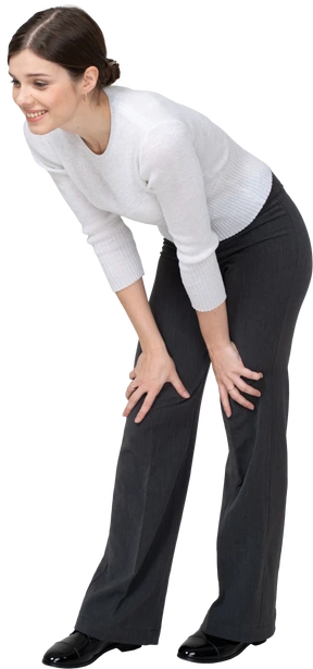 Front view of a woman bending down