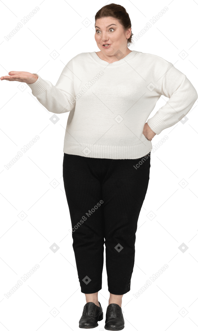 Front view of a happy plump woman in casual clothes gesturing