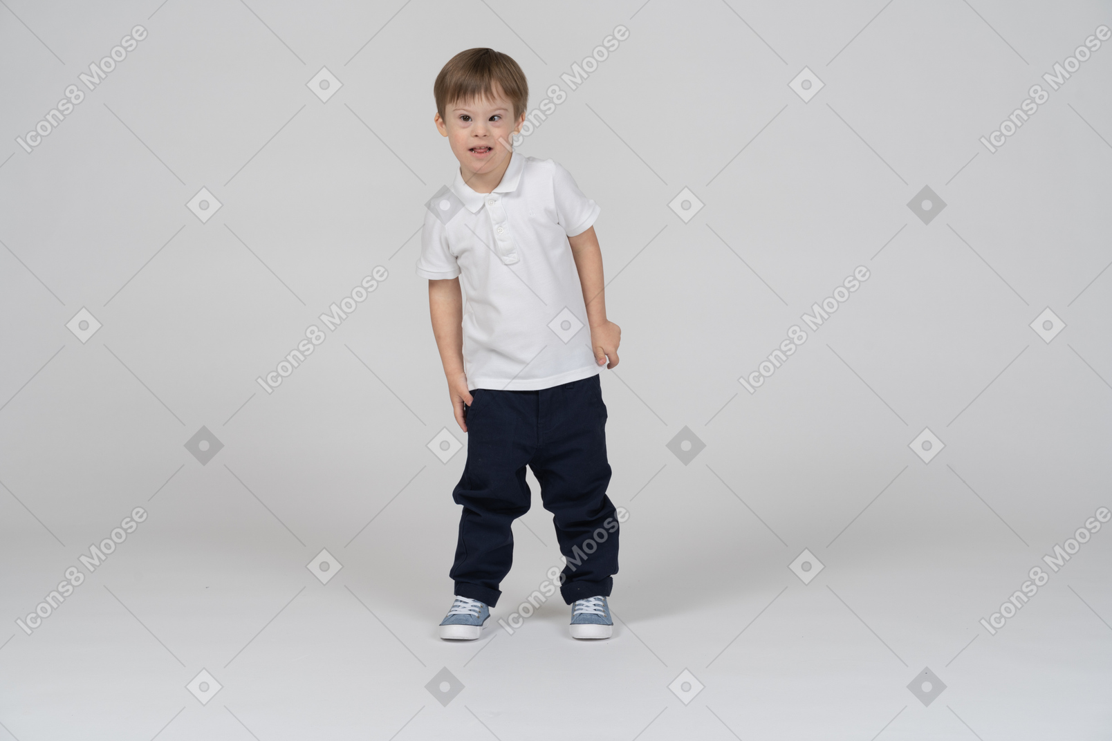 Front view of a boy looking to the side curiously