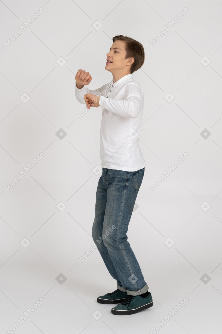Young man in casual clothes jumping