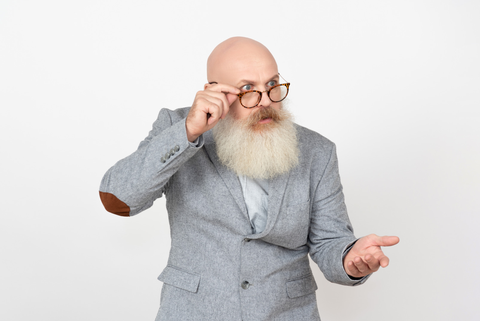 Stunned mature professor adjusting his eyeglasses