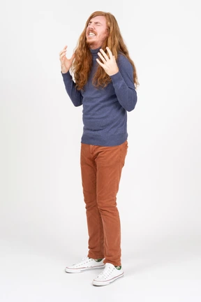 Emotional young man in casual clothes