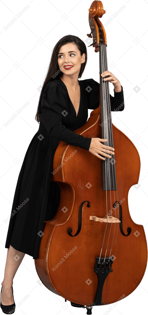 Front view of a smiling young woman in black dress playing her double-bass