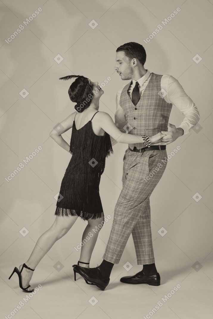 Passionate couple dancing charleston