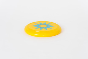 Blue and yellow frisbee on a white background