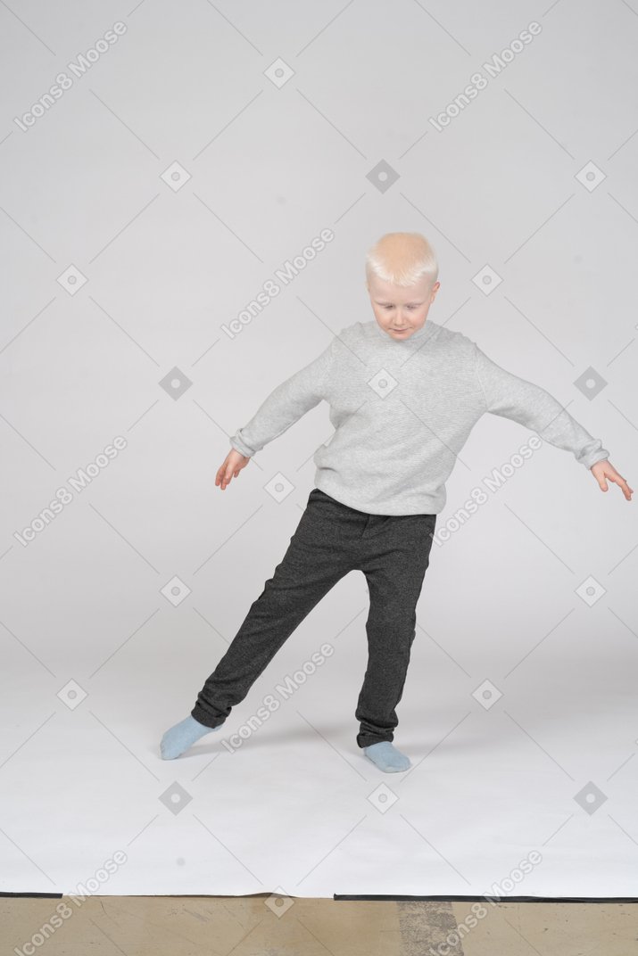 Front view of boy in dance position