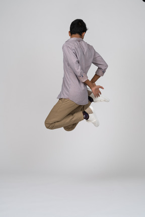 Man in casual clothes jumping