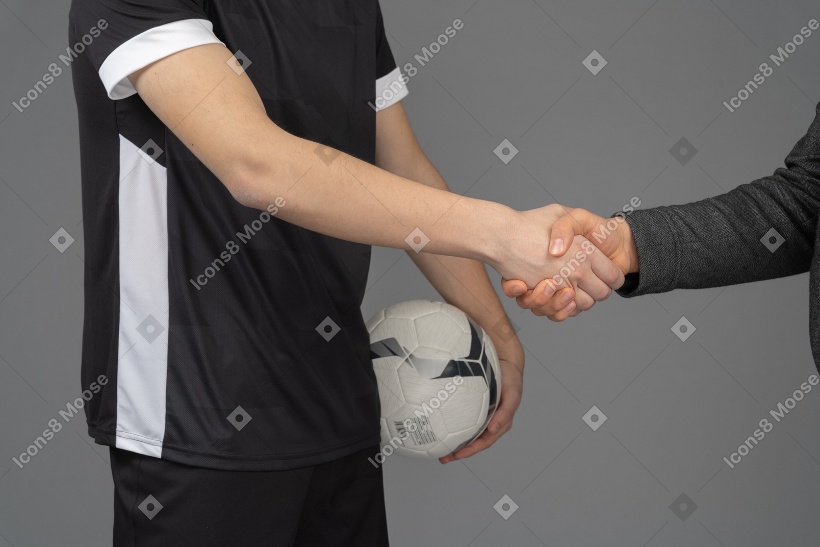 Football player shaking hands with someone