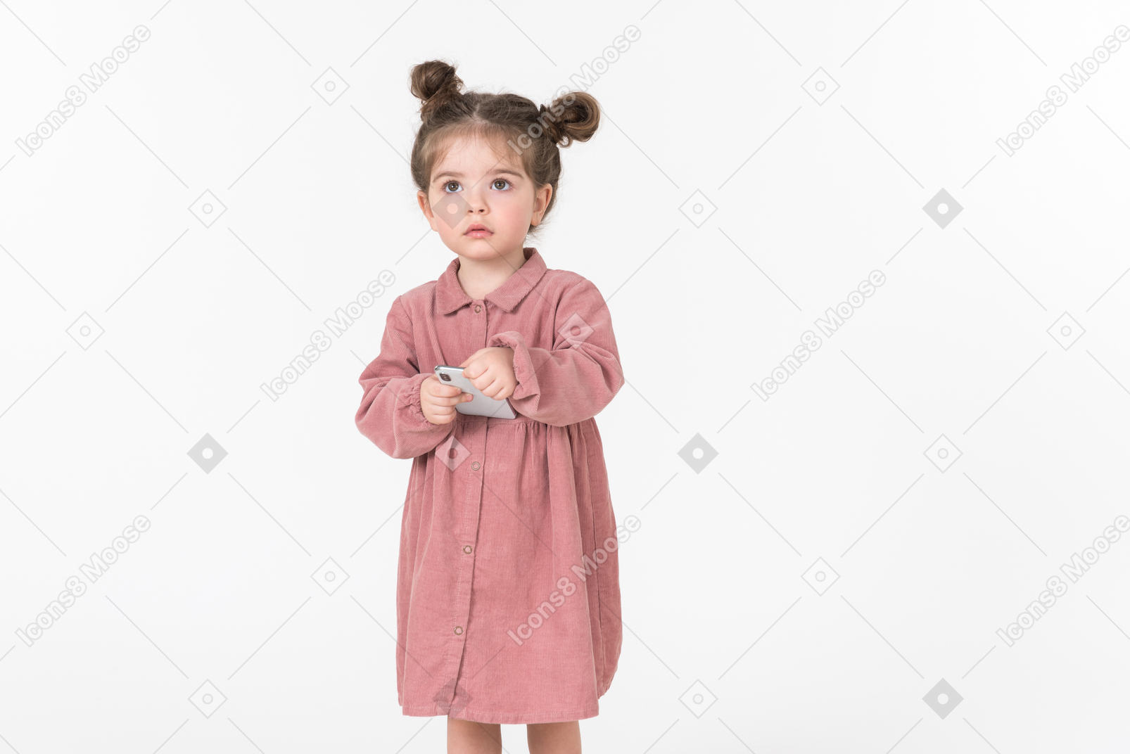 Little kid girl holding smartphone