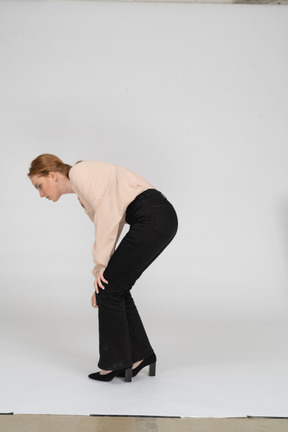 Woman in beautiful blouse standing