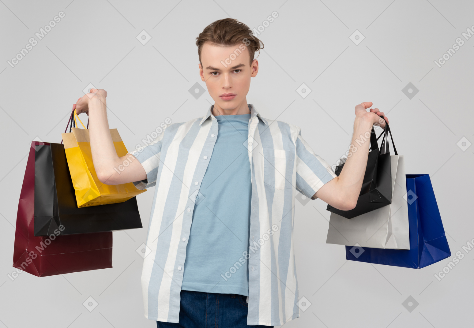 Handsome young man with shopping bags